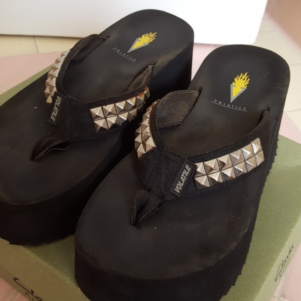 High wedge flip flops